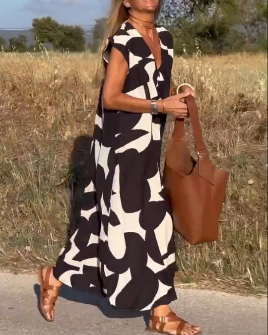 Amara - Maxikleid mit Print und V-Ausschnitt